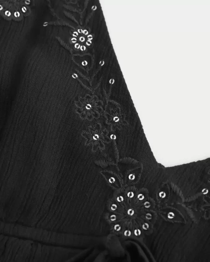 Bluzka typu babydoll z marszczeniami i połyskiem