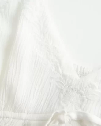 Bluzka typu babydoll z marszczeniami i połyskiem