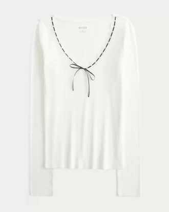 Bluzka z długim rękawem i koronkowym wykończeniem