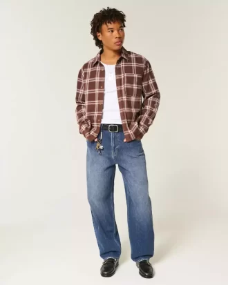 Ciemne dżinsy typu skater baggy