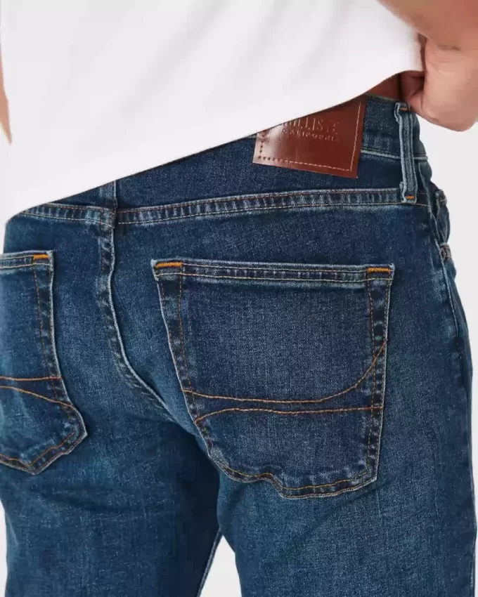 Ciemne, dopasowane, proste dżinsy