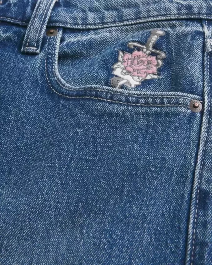 Ciemnoróżowe, graficzne, luźne jeansy Ciemnoróżowe, graficzne, luźne jeansy