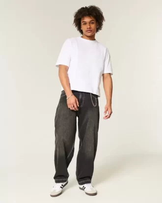 Czarne, haftowane, szerokie jeansy typu skater z motywem węża