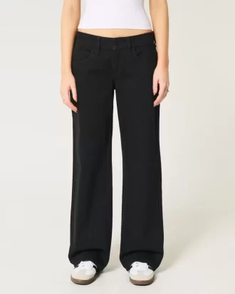 Czarne, niskie, luźne jeansy