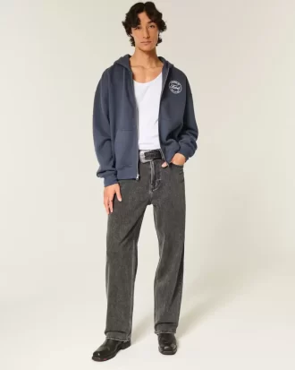 Czarne, sprane, luźne jeansy z logo