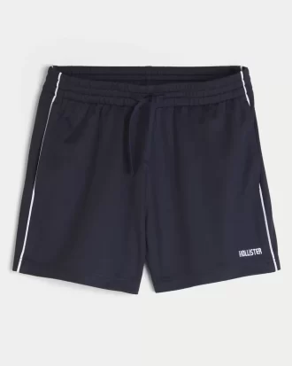 Dzianinowe spodenki piłkarskie z logo do połowy uda