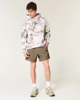 Hybrydowe spodenki aktywne do połowy uda