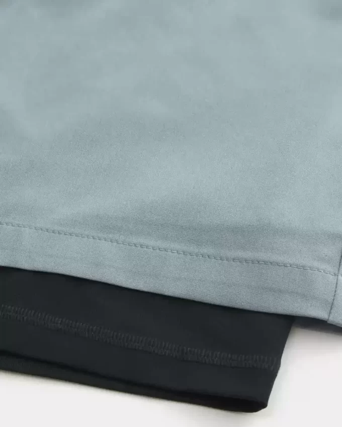 Hybrydowe spodenki aktywne do połowy uda