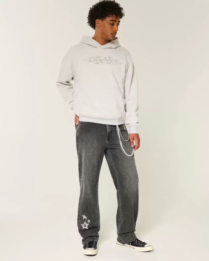 Jeansy Baggy z grafiką „Sprane czarne gwiazdy” Jeansy Baggy z grafiką „Sprane czarne gwiazdy”