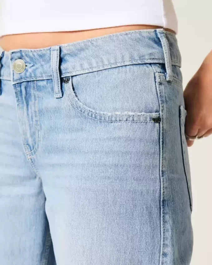 Jeansy Baggy z niskim stanem i lekkim spraniem, z ćwiekami i kokardkami