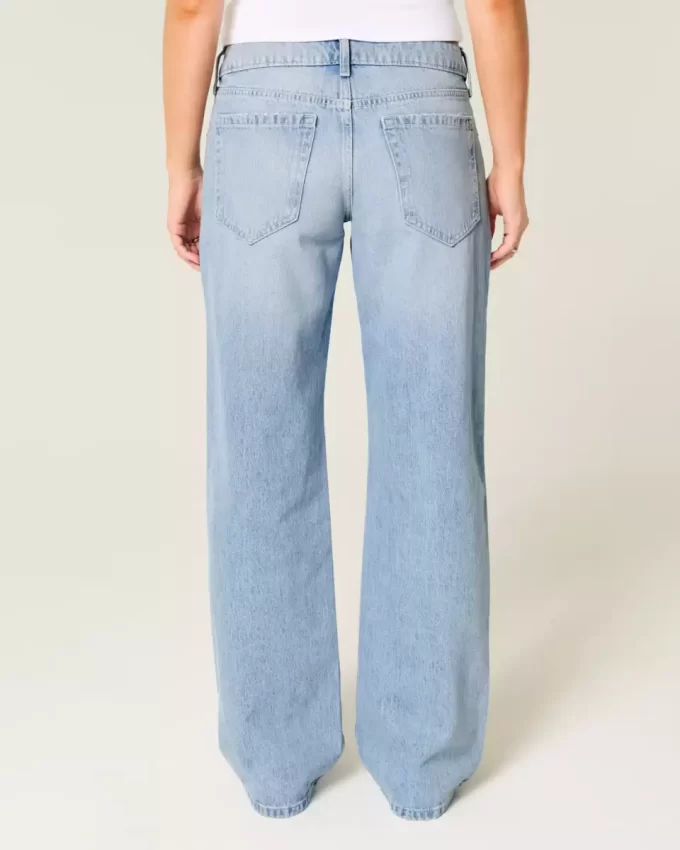 Jeansy Baggy z niskim stanem i lekkim spraniem, z ćwiekami i kokardkami