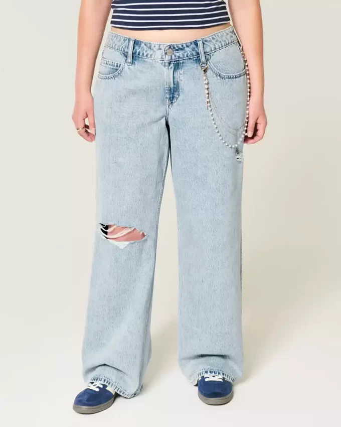 Jeansy Baggy z niskim stanem i przetarciami, w kolorze jasnego sprania Jeansy Baggy z niskim stanem i przetarciami, w kolorze jasnego sprania