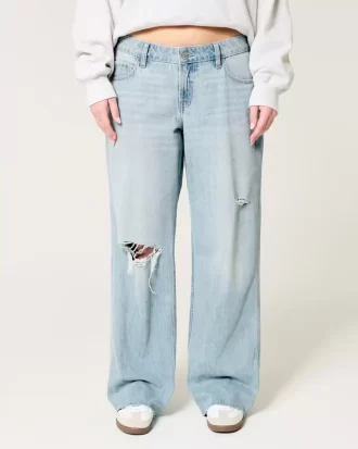 Jeansy Baggy z niskim stanem i przetarciami, w kolorze jasnego sprania Jeansy Baggy z niskim stanem i przetarciami, w kolorze jasnego sprania