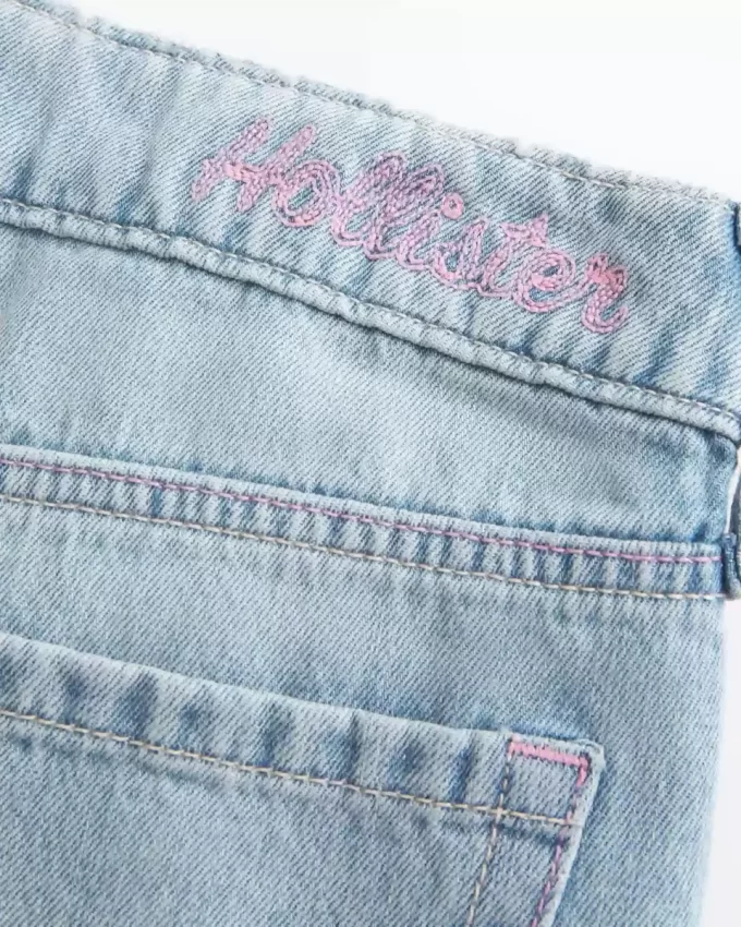 Jeansy Baggy z niskim stanem i przetarciami, z lekkim spraniem i grafiką