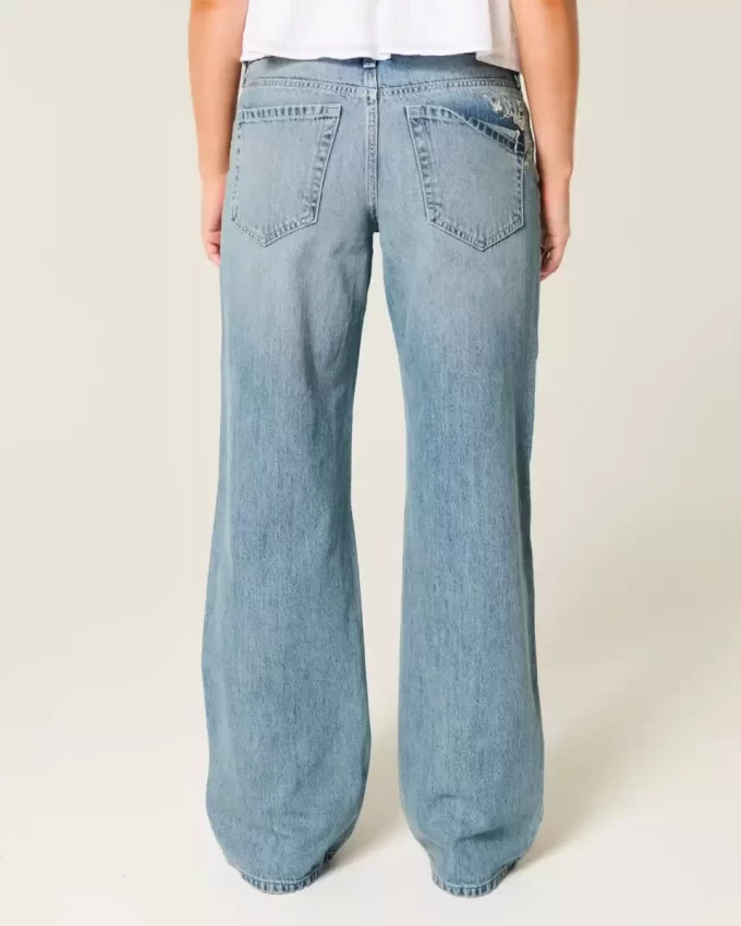 Jeansy Baggy z niskim stanem i średnim spraniem w motyle