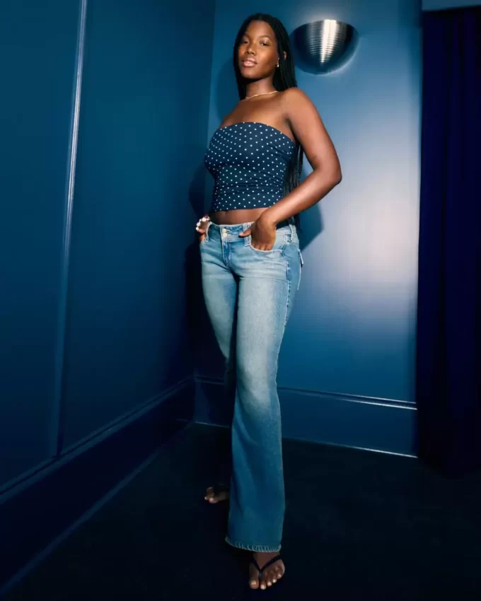 Jeansy Bootcut z niskim stanem i średnim spraniem, haftowane kwiaty