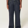 Jeansy Curvy Low-Rise Dark Wash z odkrytą talią i szerokimi nogawkami