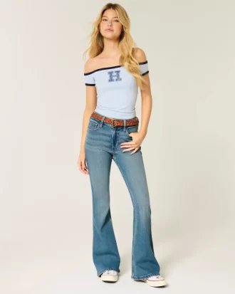 Jeansy dzwony z wysokim stanem i średnim spraniem Jeansy dzwony z wysokim stanem i średnim spraniem