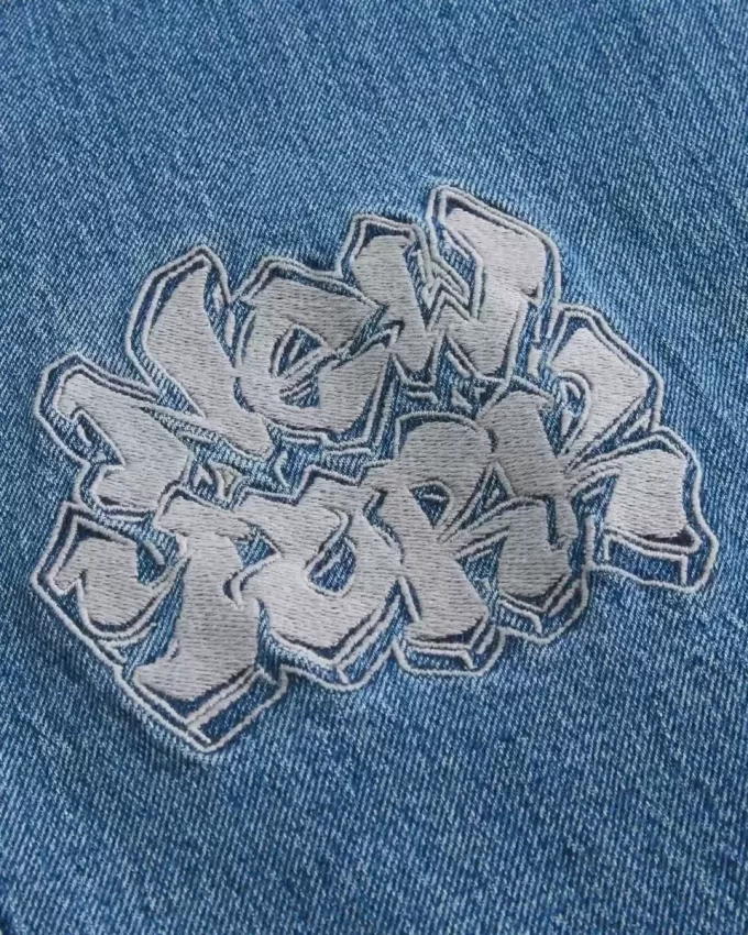 Jeansy NYC Graphic Super Baggy o średnim stopniu sprania Jeansy NYC Graphic Super Baggy o średnim stopniu sprania