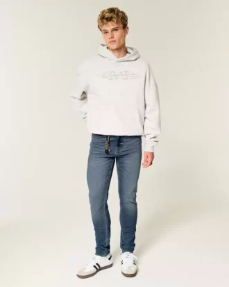 Jeansy sportowe rurki o średnim stopniu sprania