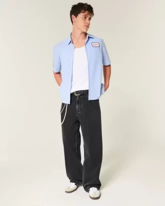 Jeansy Super Baggy z grafiką „Sprane czarne gwiazdy”