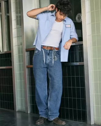 Jeansy typu skater baggy z grafiką Star w średnim odcieniu