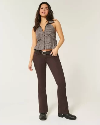 Jeansy z bardzo niskim stanem i rozcięciem typu bootcut