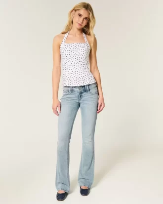 Jeansy z niskim stanem i rozcięciem typu bootcut