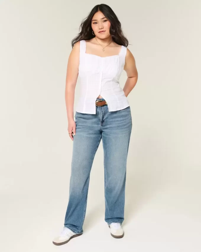 Jeansy z wysokim stanem i ciemnym spraniem Jeansy z wysokim stanem i ciemnym spraniem