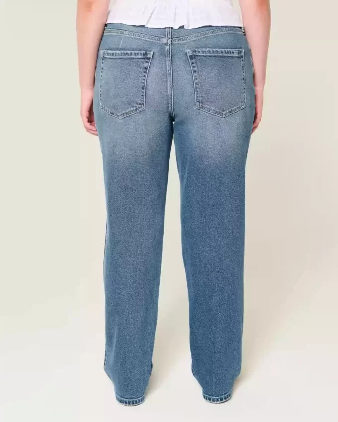 Jeansy z wysokim stanem i ciemnym spraniem Jeansy z wysokim stanem i ciemnym spraniem