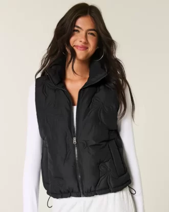 Kamizelka puchowa z kokardą