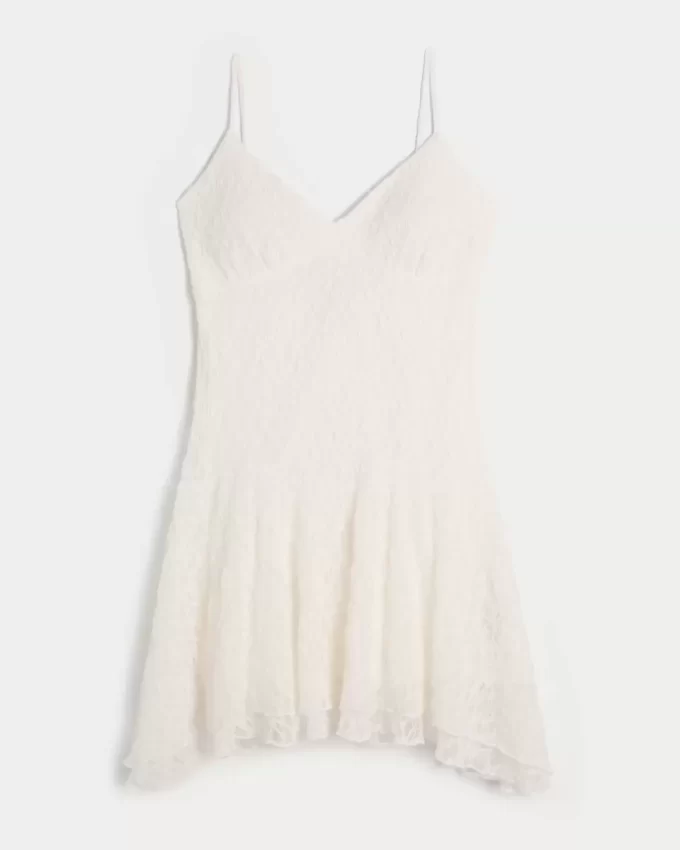 Koronkowa sukienka mini z asymetrycznym dołem Koronkowa sukienka mini z asymetrycznym dołem