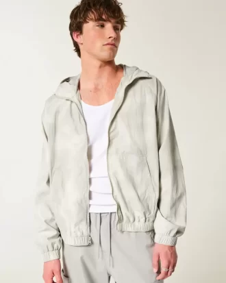 Kurtka wiatrówka z zamkiem błyskawicznym w kolorze kamuflażowym