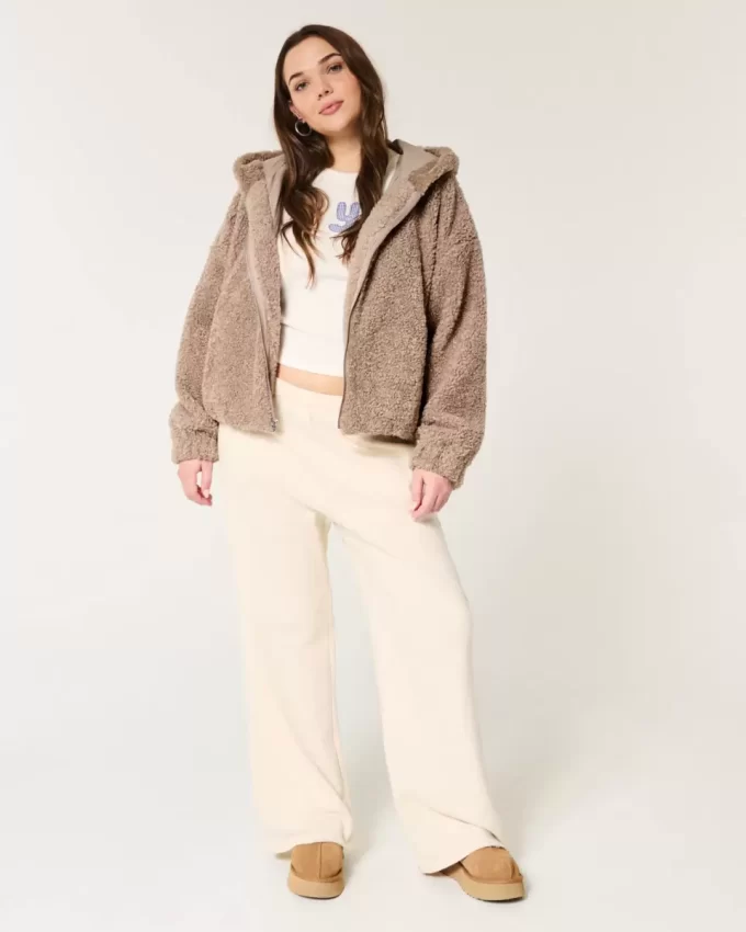 Kurtka z kręconego sztucznego futra zapinana na zamek