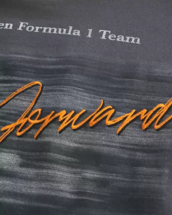 Luźna bluza z kapturem McLaren Forever Forward z grafiką Luźna bluza z kapturem McLaren Forever Forward z grafiką