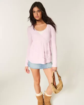 Luźna bluzka typu babydoll z długim rękawem i kwiatowym wzorem