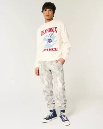 Luźne spodnie dresowe z polaru w kamuflażu