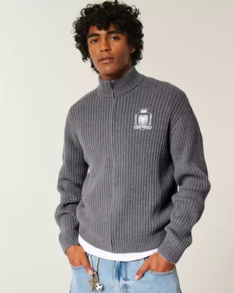 Luźny, graficzny sweter zapinany na zamek