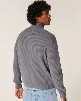 Luźny, graficzny sweter zapinany na zamek