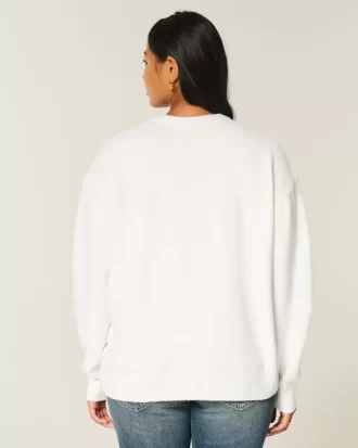 Luźny sweter z nadrukiem misia