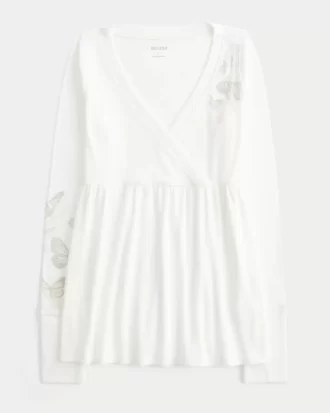 Luźny top typu babydoll z długim rękawem i wzorem motyli