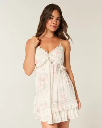 Mini sukienka z falbanką i ćwiekami