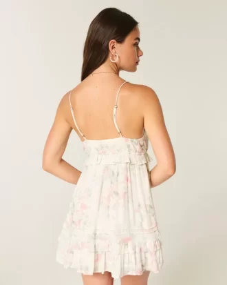 Mini sukienka z falbanką i ćwiekami