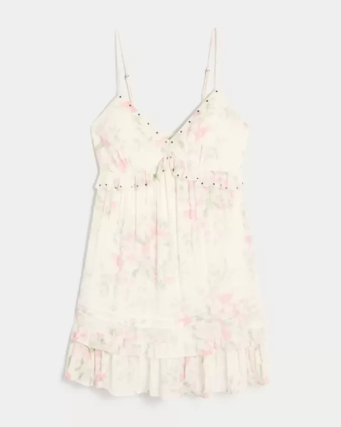 Mini sukienka z falbanką i ćwiekami Mini sukienka z falbanką i ćwiekami