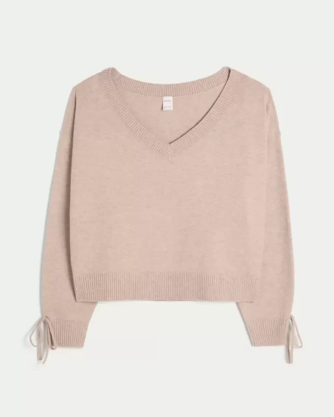 Przytulny sweter z kokardą odsłaniającą ramiona marki Gilly Hicks Przytulny sweter z kokardą odsłaniającą ramiona marki Gilly Hicks