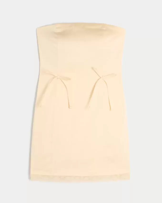 Satynowa sukienka bez ramiączek z kokardą