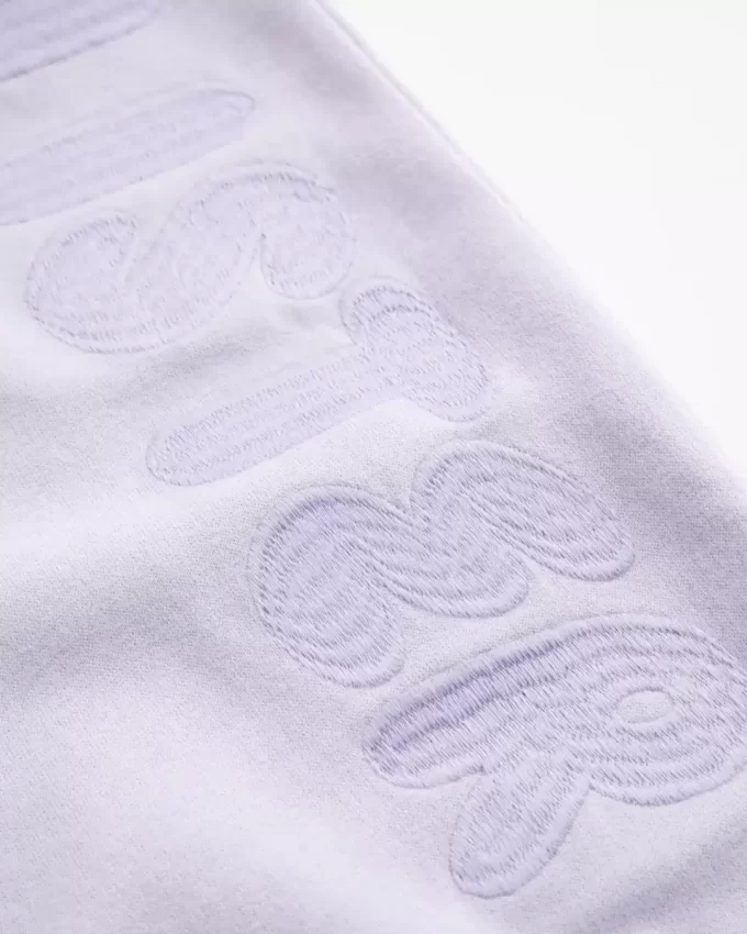 Spodnie dresowe z szerokimi nogawkami i logo Spodnie dresowe z szerokimi nogawkami i logo