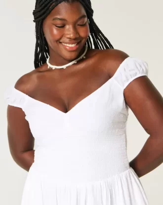 Sukienka mini z odkrytymi ramionami i asymetrycznym dołem