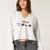 Sweter Hollister Comfy Cloud Graphic z wycięciem pod szyją Sweter Hollister Comfy Cloud Graphic z wycięciem pod szyją