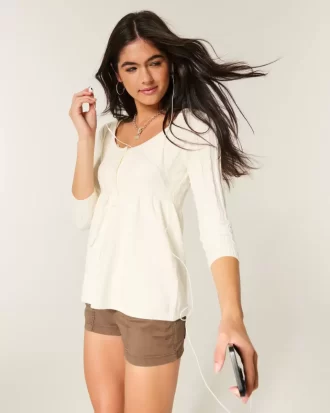 Sweter typu babydoll z warkoczowym splotem